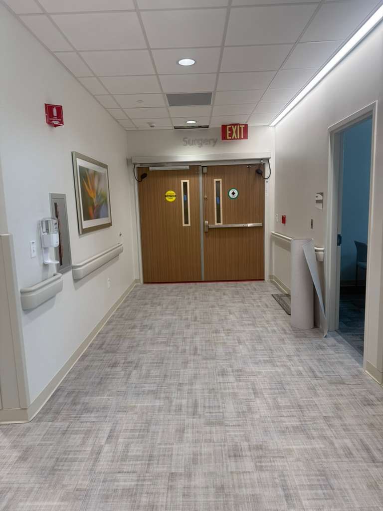 Heavy-duty corner guards installed on clinical drywall partitions