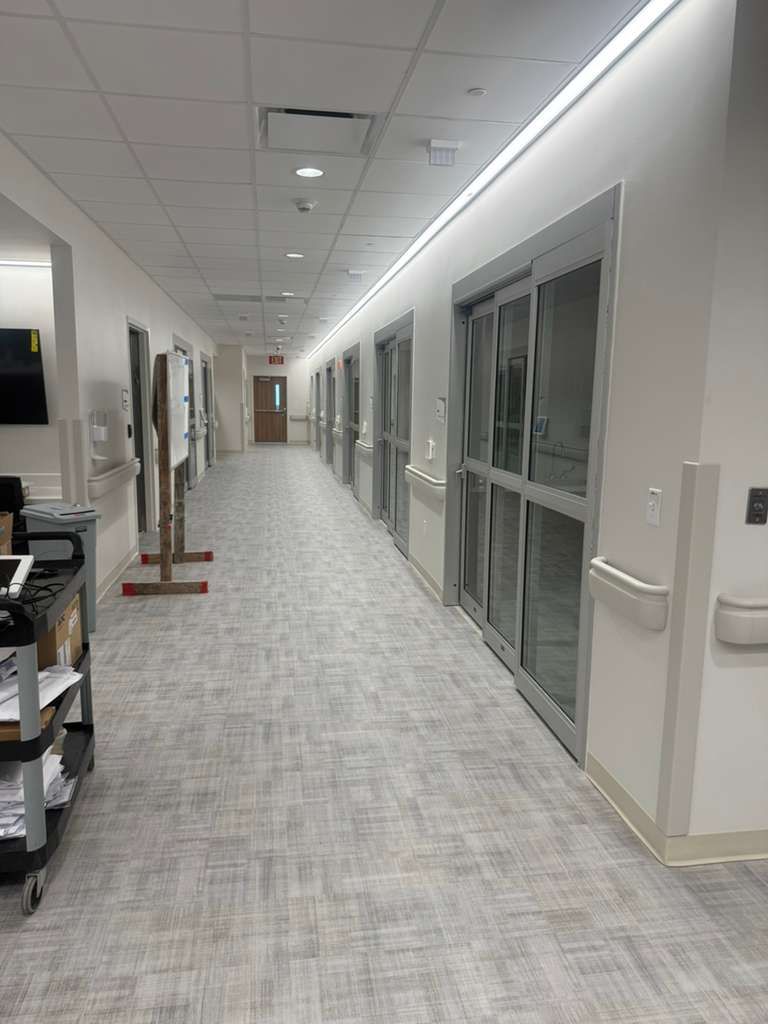 Patient care hallway showing seamless installation of vinyl corner guards