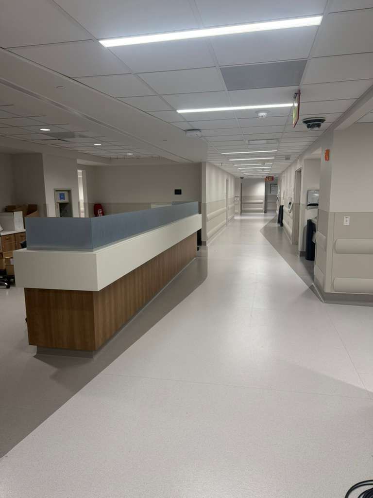Waiting area featuring clean-finish vinyl crash rails